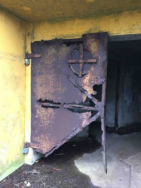 rusted doors and damp hallways