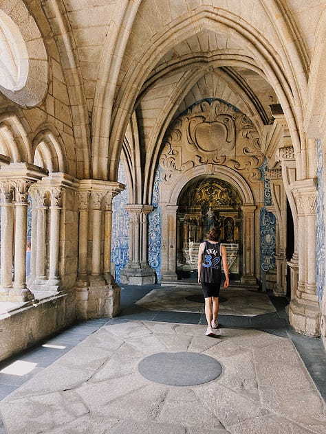 Photos of blue and white tiles, orange rooftops, and cathedral cloisters in Portugal, with a young white man and woman in frame