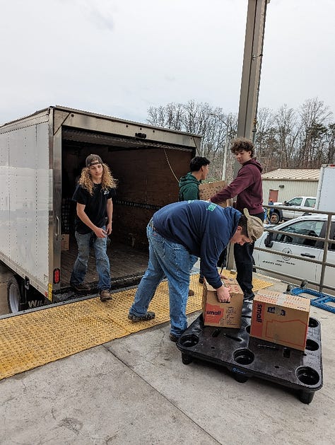 Stafford High School students pack and load meal kits for delivery to county schools. The service learning project was enabled by a $17,000 from Giant Food. Photos courtesy Stafford County Public Schools.