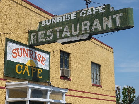 1950s sign for diners, hotels, restaurants, and businesses.