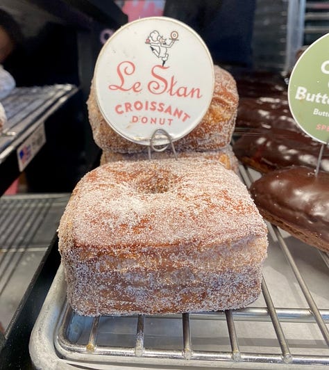 Image 1: photo via official Cronut®️ chef @dominiqueansel Instagram showcasing their monthly March Cronut®️ (Lemon Curd & Graham Cracker). Images 2 & 3: "Le Stan", Chicago's take on the doughnut/croissant remix (photos by Jolene Handy) 
