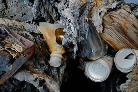 Image of burned trash mound, two close-up images of burned trash