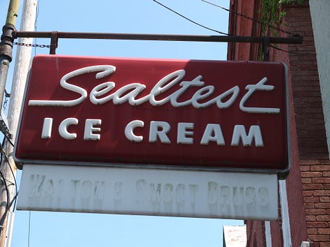 1950s sign for diners, hotels, restaurants, and businesses.