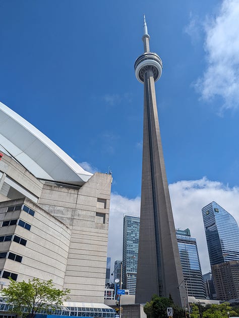 3 images of Rogers Centre (formerly SkyDome) in Toronto, Canada.