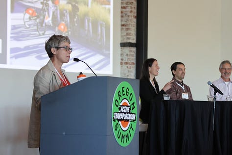 “I Love SRTS” hat attends the Safe Routes to School Annual Meeting at #OATS24, along with dozens of SRTS practitioners from across Oregon, including The Street Trust’s Deputy Director Lindsay Huber and N. Clackamas Coordinator Nicole Perry (not pictured). 