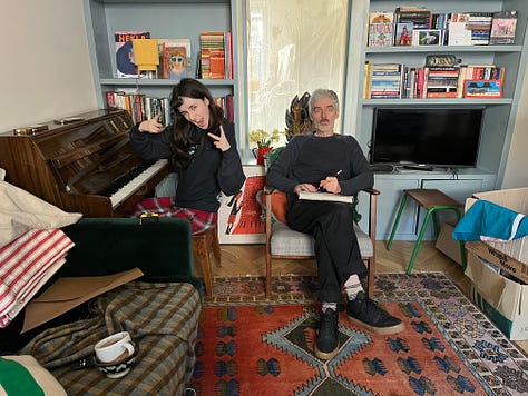 Photos of disorganised Artist book shelves and