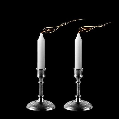 An illustration of two white candles on silver holders, with the candles’ flames being blown sideways. 