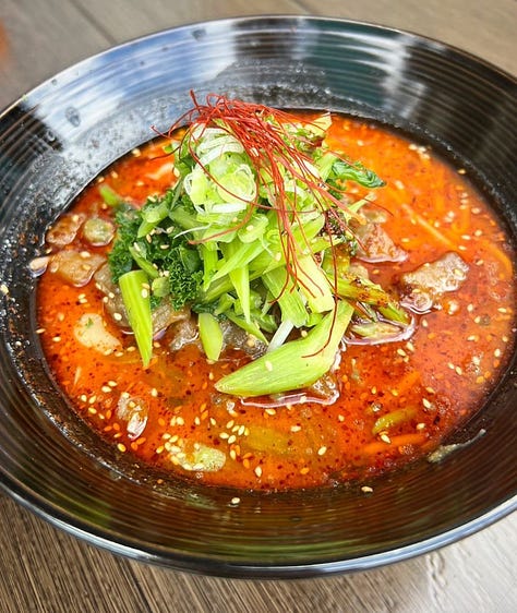 Menu items from Rice, including a vegan and gluten-free spicy miso ramen