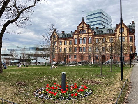 City hall park is a wide open space with interesting architecture around