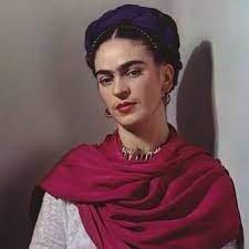 Three images of black-haired Frida Kahlo in black-and-white and color photos. Kahlo on the left in the black-and-white photo  shows her  painting. Kahlo in the middle color photo wears a purple ribbon threaded in her hair gold jewelry, and a dark pink cape. Kahlo in the right black-and-white photo leans back and wears a scarf and has a ribbon threaded in her hair.