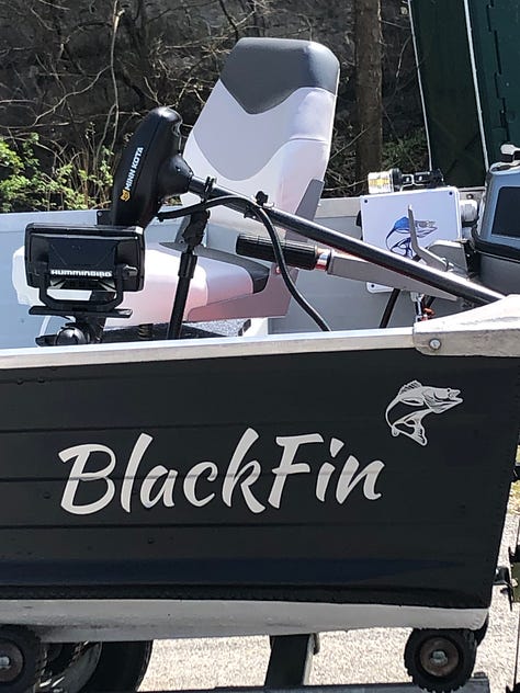 A peeling, sun-damaged, debris-filled red boat transforms into a sleek, black craft for Daddy-Daughter bonding