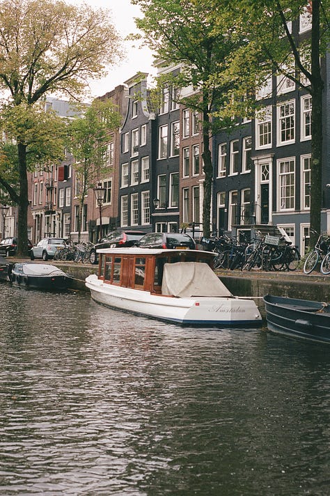 boats on a canal, woman in boat