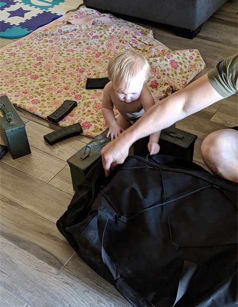 Shawn Freeman gives baby ammunition to play with while loaded firearms are within the child's reach. Mesa Police Officer Shawn Freeman irresponsible gun safety