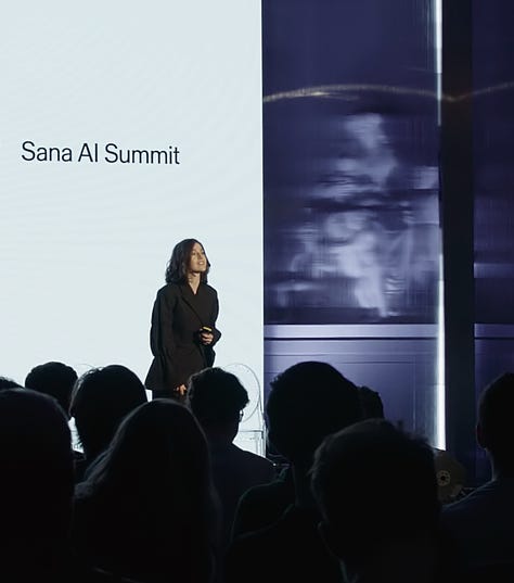 1 - Sana billboard at London's Old Street Roundabout with a bus in the forefront, 2 - Lauren on stage at the Sana AI Summit, 3 - Sana featured on the Nasdaq billboard in Times Square New York