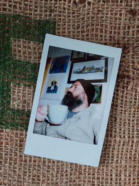 Instant photographs of coffee mugs or coffee drinking selfies by a bearded gentleman with a bald head.