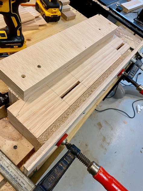 A jig made (relatively) easy work out of cutting mortises and shallow grooves into my bench legs.