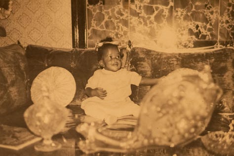 — my mom as a baby (top left), my maternal grandfather's old polaroids and camera (top middle), me and my granddad (top right), my paternal grandmother (bottom left), a letter from my mom's foster dad (bottom middle), a photo of my mom and my grandparents (bottom right)