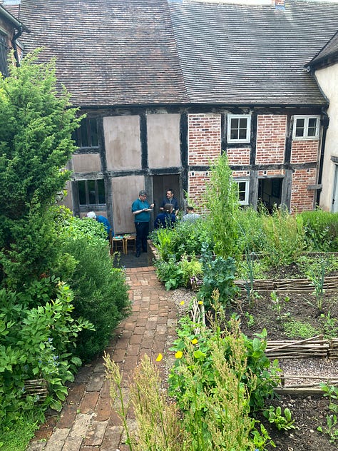 Participants spending time in the Weaver's workshop garden after the diagramming exercise