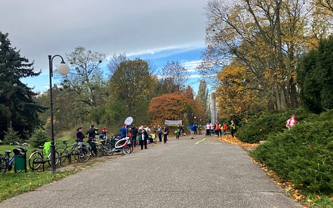 A banner marks the finish, off to one side of the path