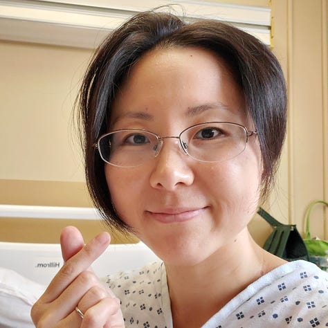 A photo of an unmade patient bed, a photo of my selfie with a smile crowwing a thumb and an index finger to form a mini heart, a hospital recliner with a side table