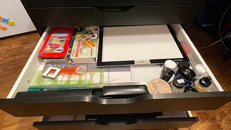 All six drawers full of art supplies
