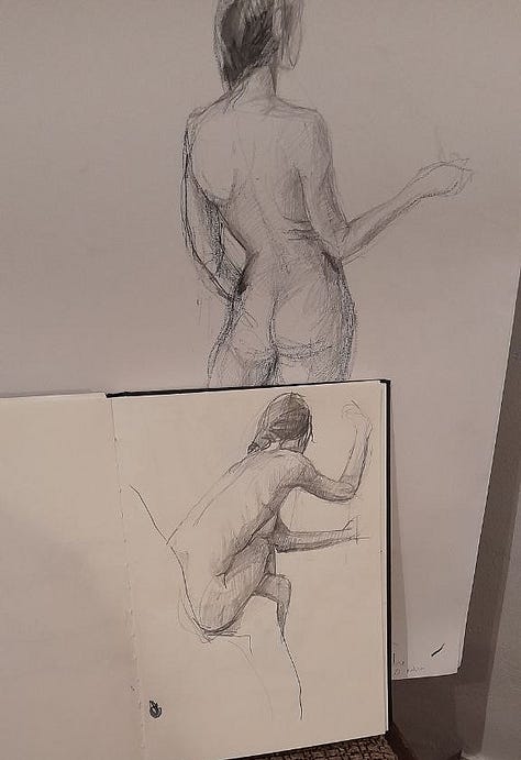 Female life model in poses with props