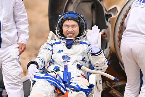 Wang Haoze (left), Song Lingdong (center), and Cai Xuzhe (right) after exiting the Shenzhou-19 spacecraft in the Inner Mongolia region.