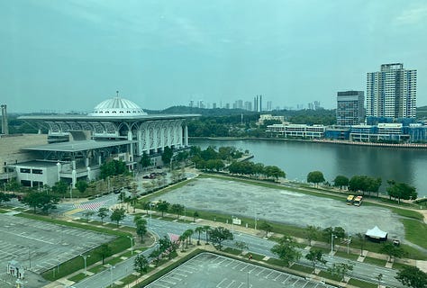 The outside of the Dorsett hotel; view of the Iron Mosque, view of bridge from 9th floor gym