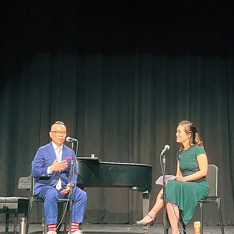 Dominic Lim reading on stage, speaking with Jessica Wan, and my copy of the book and playbill