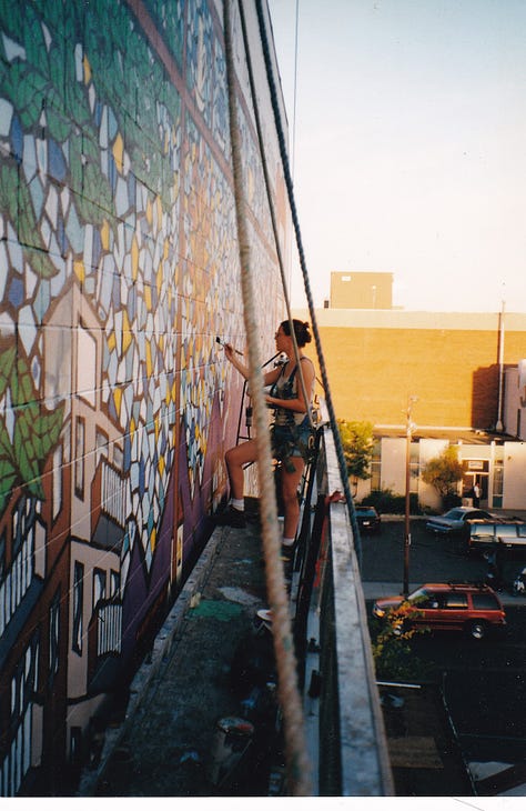 Pictures of murals on some walls in Calgary.