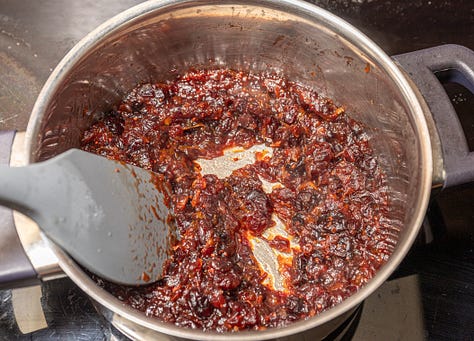 Making orange cranberry jam