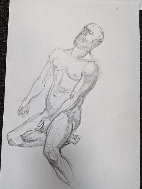 Male life model poses for life drawings