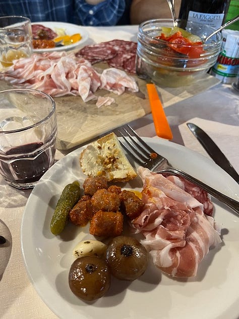 Top L to R: starting at piazza San Martino in Lemna, frost on the trail up, hiking and friends, antipasti e vino, stinco secondo, Coco licking the remains of my pizzocheri plate, homemade cakes for dolce, and the walk down at sunset, 