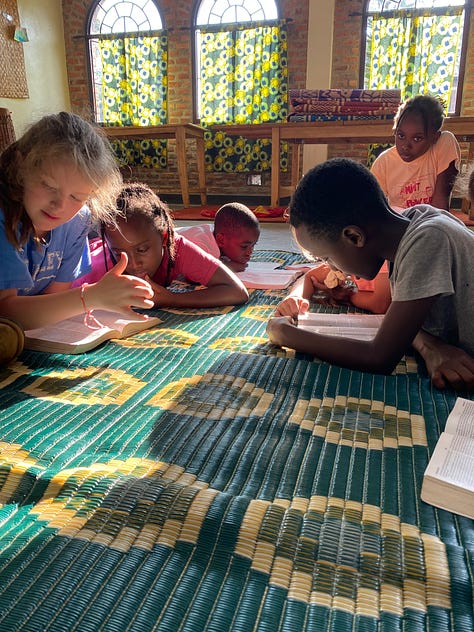 Anniversary photo with a view; Visiting new babies; Our Homeroom grades 9 and 10; My visit to Butaro Hospital; Grade 7 Science; Thanksgiving with Rwandan family; Grades 3-5 Bible club; Taco Nights by flashlight; Appreciating other cultures at the International Picnic