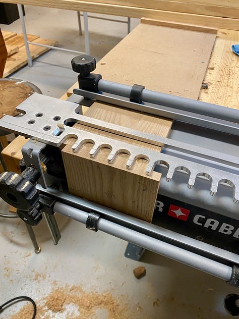 Cutting half-blind dovetails using a jig.