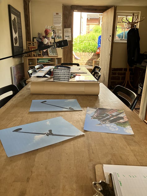 The Holyhead Road diagram, table with diagramming materials at the Weaver's workshop, workshop organisers getting ready in the garden