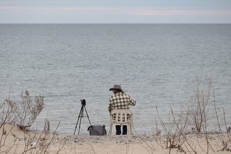 Photo of John Charlton waiting for clouds to clear by Ron Waddling