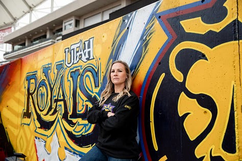 Amy Rodriguez poses for photos at America First Field upon being introduced as the new head coach of the relaunched Utah Royals FC. (Photo: Laura Dearden, Utah Royals FC)