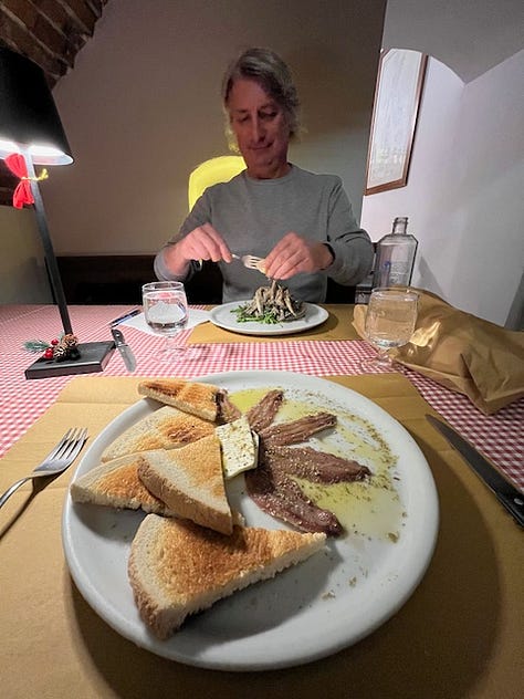 Top L-R: Coco joyously digging for clams, happy bare winter feet in the sand, beautiful Varigotti, beachbasketball court, my favorite place for pasta al pesto in Spotorno, sunset from our room, trofie al pesto, my smile says it all: nothing like Ligurian focaccia for breakfast, fresh local anchovies 2 ways