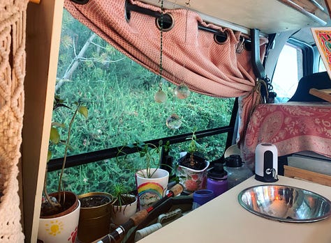 1. A gutted diy van. 2. The same van with a bed and sleeping bag and twinkle lights. 3. The same van years later with a kitchen and furniture. 4. Plants on a window ledge in a van. 5. Plants hanging from a van door. 6. A writing desk with notepad, notes, and an orange light inside a van.