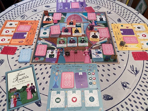 The boxes for "The Jane Austen Game," "The World of Jane Austen" puzzle, "Matchmaking: A Jane Austen Memory Game," and "Jane Austen Playing Cards." Image 2: The game board during a round of play for "The Jane Austen Game." The many pieces are assembled on the board. Image 3: The Emma Woodhouse character board and character cards during a round of play of "The Jane Austen Game." Image 4: Cards from both "Matchmaking: A Jane Austen Memory Game" and "Jane Austen Playing Cards" are spread out on a table next to "The Jane Austen Game" and "The World of Jane Austen" puzzle. Image 5: A close up of the cards from "Matchmaking: A Jane Austen Memory Game" 