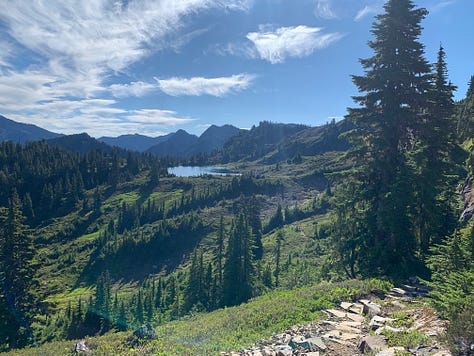 Doing a short cave hike with the boys. Top of the mountain selfie! Amazing views of the Olympic interior. Post mountain climb feast. Scrambling on the Olympic coast. Petroglyphs of an orca, a salmon? and some bears.