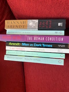 A selection of books in nine images. Each image has several books all lined up together in a row. One is a top-down look at four books that features their covers instead of their spines. Titles include:  W.E.B. Du Bois' "The Philadelphia Negro," "Between Past and Future" and "Human Condition" by Hannah Arendt, "Middle Passages: African American Journeys to Africa," 1787-2005," Michael Eric Dyson's "Holler If You Hear Me," and "City Schools and the American Dream: Reclaiming the Promise of Public Education" by Pedro A. Noguera and James A. Banks