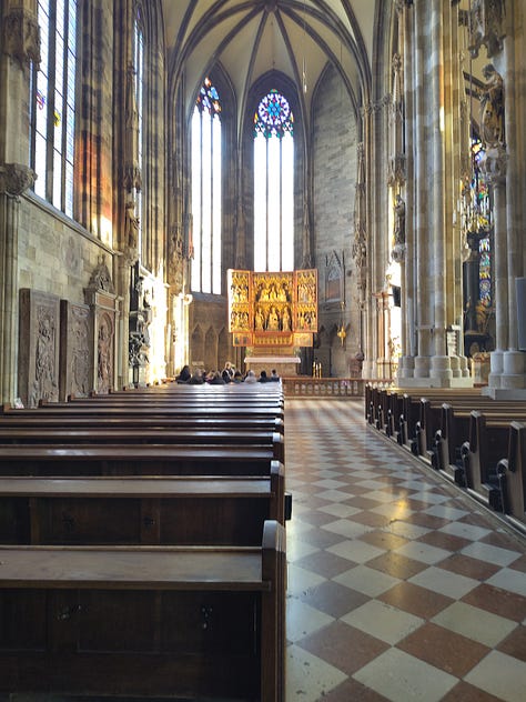 Photos of the exterior and interior of the Stephansdom, a 14th century Gothic cathedral in Vienna.