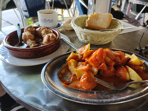 Sourdough bread, lentil stew, albondigas meatballs, patatas bravas, the sumptuous dining at Palacio Real