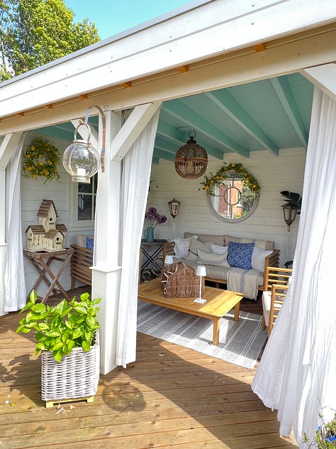 Monochromatic interior design, garden porch and a light neutral dining room