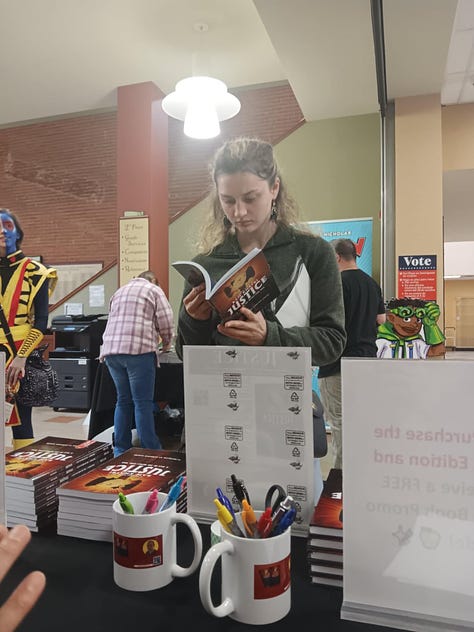 Gallery of images from Comic Con at Bosler Library in Carlisle, PA, featuring Ram Khatri sharing Justice: A Tale of the Nepali Civil War with American audiences, joining creators, artists, and librarians in celebrating diverse stories and resilience.