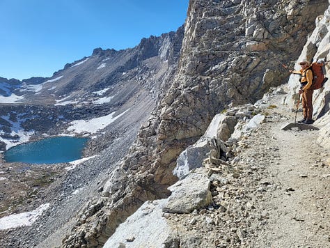 Tall granite mountains with paths leading to sights unknown