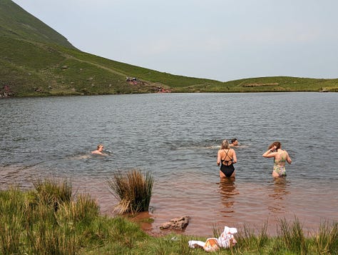 wild swimming on pen y fan in the brecon beacons