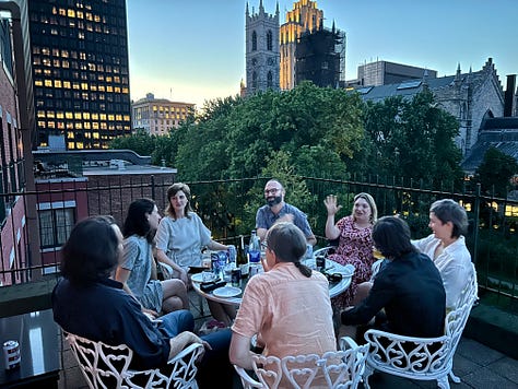 Photo 1: A group of poets/friends on a terrace in Old Montreal. Photo 2: A flier of Kirby's reading for She on a screen door in Kingston ON  Photo 3: Kirby reading in a living room.